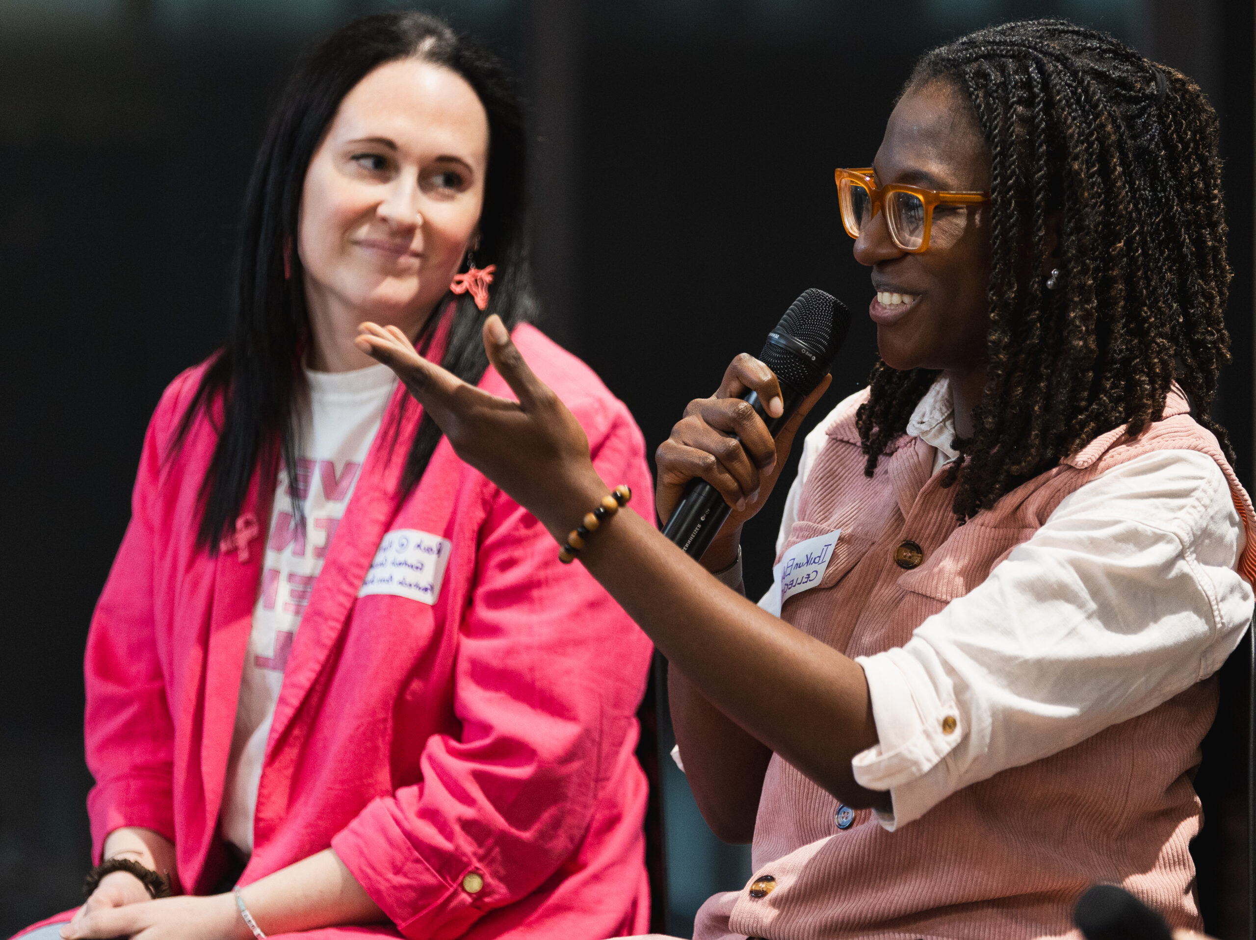 Panelists speaking at one of our events.