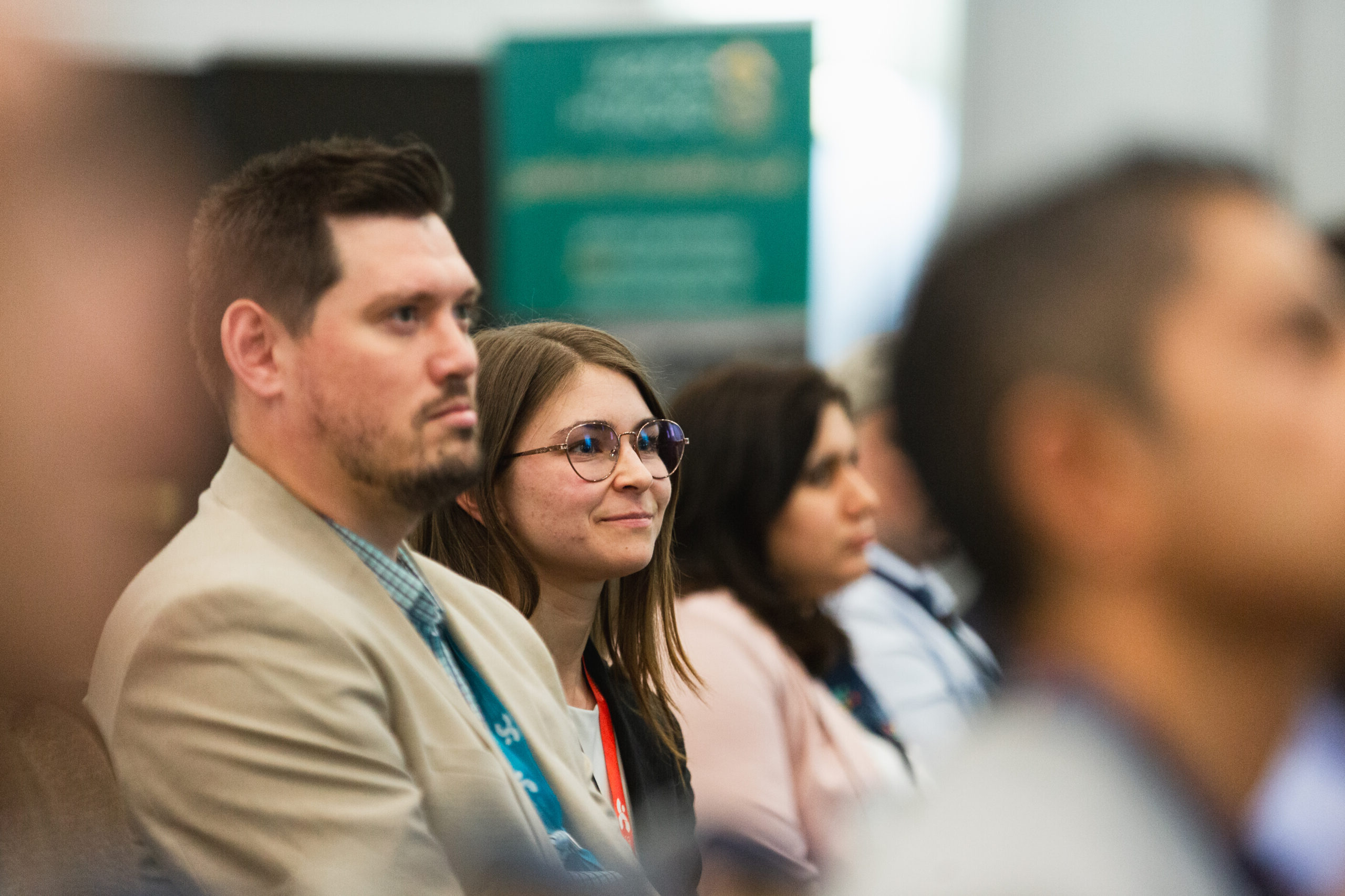 Audience listening to a workshop presentation.