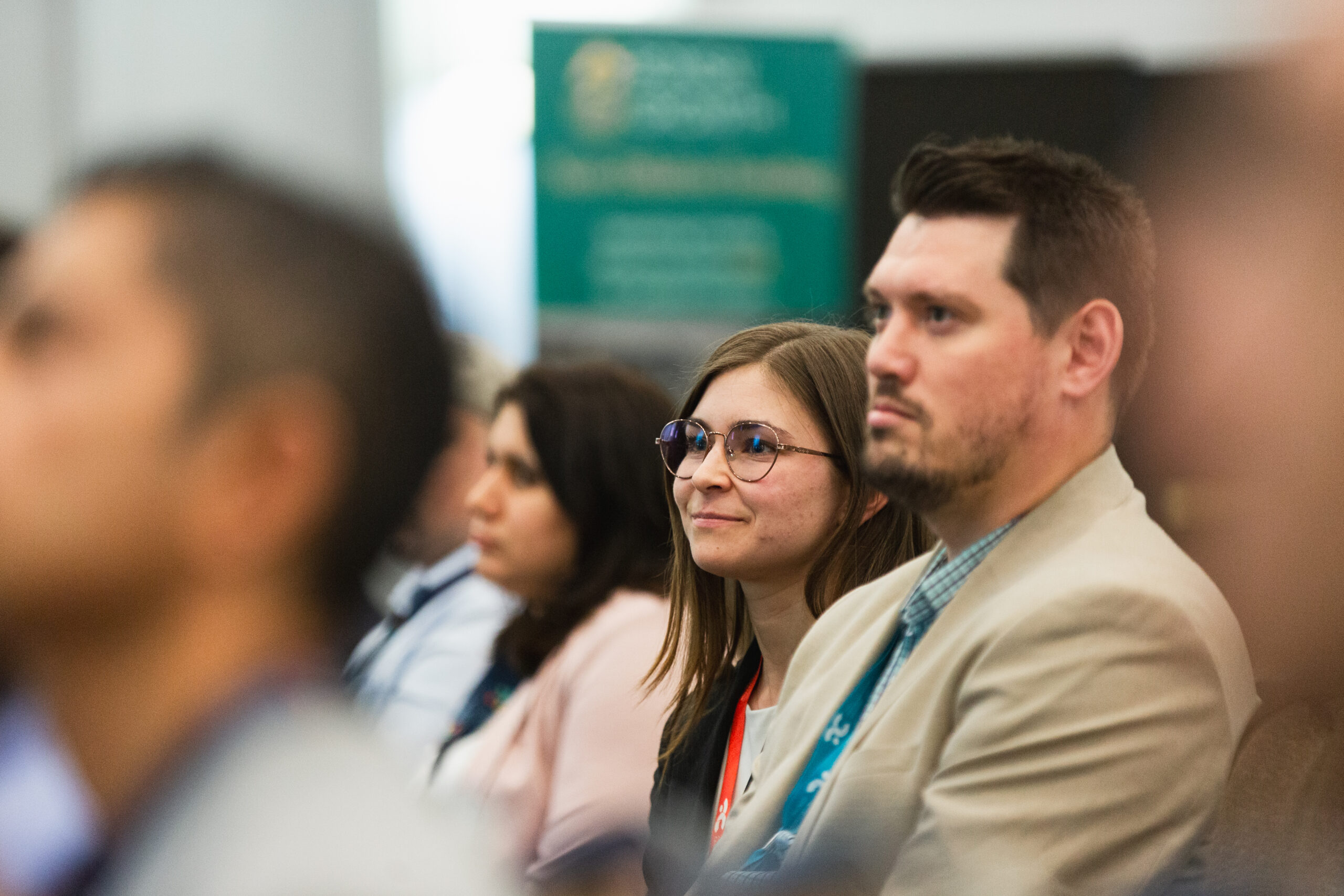 Audience listening to a workshop presentation.