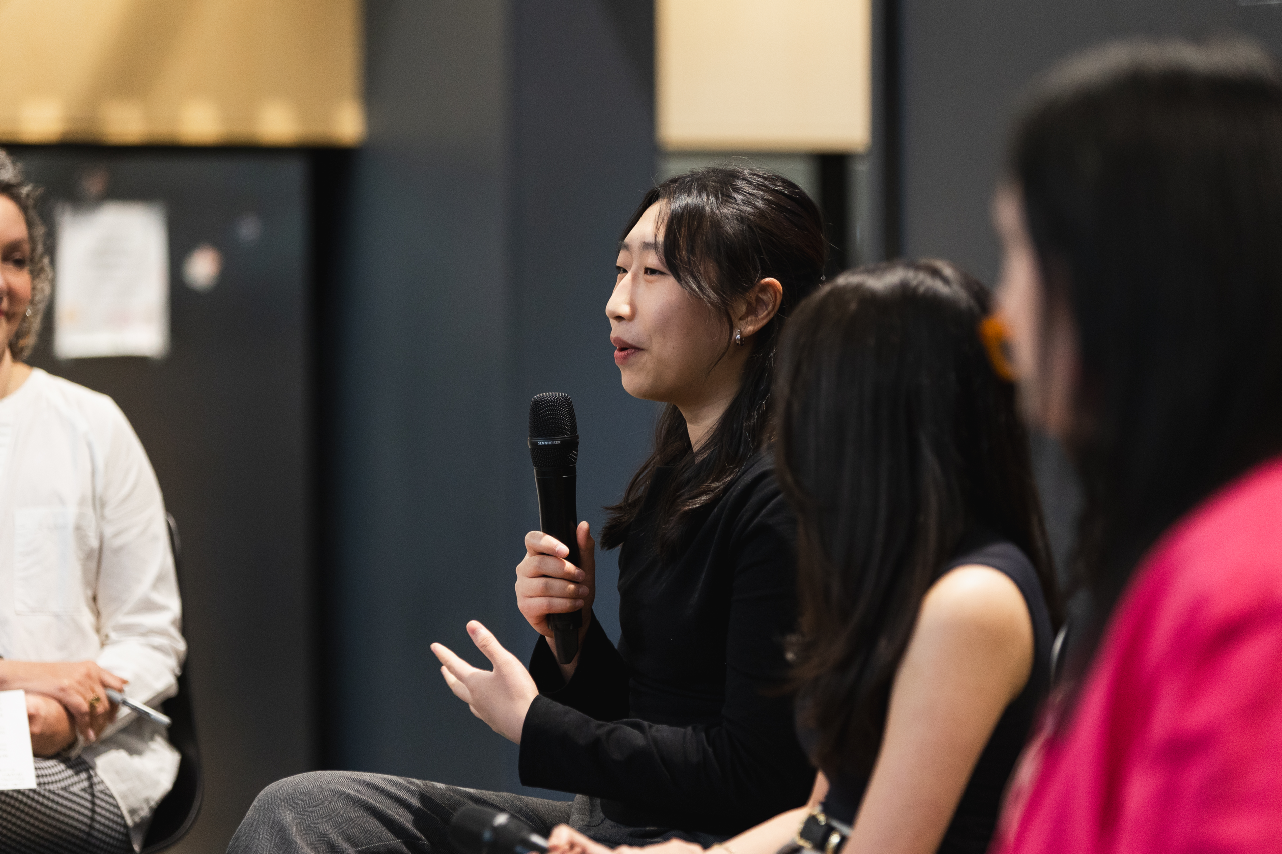 Panel speaking at an event.